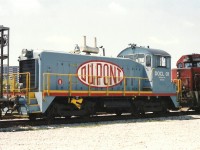 Dupont SW900 being shipped on CN pauses in Parkdale. Photo taken from the Country Style parking lot.