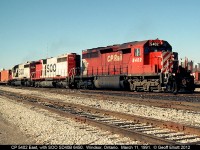 A different kind of "A-B-A" set of power on CP 502 tonight.  CP 5402 leads one of a kind SOO Line SD40B #6450 and SOO Line 6618 as they crest the top of the hill after having come into Canada via the Detroit River Tunnel.  Photo taken at Windsor South on March 11, 1991.