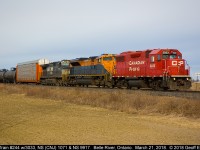 Thanks to a H/U via Earl Minnis from Mike Harding late the night before that 244 was leaving Elkhart with the NS 1071 leading.  This gave me some motivation to watch what was going on this morning.  After tracing as in Windsor @ 0800 I figured I'd have a chance.  Eventually, with numerous people giving status updates, 244, with new CP leader #3033 (hot plate equipped!) got rolling and I was able to snag a shot of the train just east of Belle River.  Nice colorful consist on a bit of a drab day but the sun peaked out just long enough to shed a little light on the subject.  That's another NS Heritage I can cross off the list.