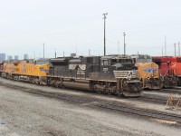 NS SD70M-2 2717 and UP EVO 5654 wait for their assigned train out while the 2 UP units behind the NS will be departing shortly on Train 421. The UP AC440 9780 seems to have a recent coat of paint.