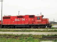 Shortly before being repainted into the Canadian Pacific block lettering GP38-2 7306 is seen outside of Plant 2 at Agincourt. It started out as Lehigh Valley 319 before being acquired by the D&H in the Conrail merger of 1976 as their 7319.