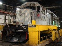 CITX 3091 is ex CP SD40 #5552. This lease unit was rebuilt to dash 2 standards and has it's front truck resting on the "Whiting" drop table.