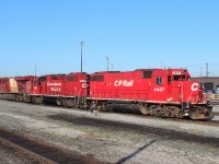 A set of yard power with two ex Soo GP38-2 units occupy track 5 west along with Olympic unit 8876. Visible alongside the 4407 are the ties in the ground of track 6 west that used to lead to the old Agincourt loco service island.