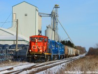 There are two companies at the "mill" in Shakespeare. SMI and Quality Fertilizers. I never did shoot GEXR showing the Quality Fertilizer side of Shakespeare - The fertilizer place is the covered wooden elevator as you (<a href=http://www.railpictures.ca/?attachment_id=28625 target=_blank>see here </a>) but when 568 stopped to work Quality back in January I along with a couple others gladly stopped for a shot.<br><br>CN's return to the Guelph sub has been really good for photographers, we had tonnes of new old power of all types in the first few months, and continues to have some photogenic motive power today,  but it hasn't been that great for the customers. Four have already switched from CN, including: Hunts in Cambridge (no more long trains down the Fergus!) which switched to CP in London, Quality in Shakespeare (to GEXR), Stella-Jones (Guelph Utility Pole) to OSR/GJR and one much lesser known customer. It's unknown if they may decide to switch back, as anything in the multi-year vision of a business customers tend to see-saw between carriers and it could come back, if the service is still available. This hobby is also a multi-year (decade) vision for many and I'll continue to capture CN photos locally - this hobby of ours still has plenty to offer and I still have much catching up to do to get more of my favourite GEXR shots in the "new' CN era. Many have done it decades before me :)