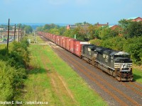 And for James Knott and the other youngins - in 2006 we knew NS was on their last legs in Ontario and many of us made sure to photograph it, the only thing was both trains ran EARLY and arriving trackside 0800 was about as late as you could try for both around Bayview to get at least one of them. (and if you tried Ingersoll or Port Robinson, subtract an hour!) NS 327/8 was a hot automotive train designed to get cars to/from the Buffalo Stamping Plant (off the Buffalo Southern Railway, now B&P) to St. Thomas Ford plant and timing was everything apparently. If there were no cars it ran anyway, light power or with whatever it had on hand. Around this time they started running the train as needed and cancelling trains some days, even combining them into big long monsters and things weren't as routine as they usually were. This is a regular 328 the only thing odd about it is the timing, it's 12 PM and it should have been through 4 hours earlier. There was only 3 months left at this point.<br><br>
And Mr. Knott would be interested to know that NS has rights to all the business on the St. Thomas and Eastern and the CN portion of the Cayuga Sub in St. Thomas - ST&E and CN would interchange cars destined for NS in St. Thomas and 327/8 would regularly have hummer frames from Formet, and fertilizer/grain from business on the ST&E. Same for traffic on the Payne sub and possibly the Chatham, but i'm not 100% sure on that after 344/343 stopped running January 2004 west of St. Thomas. The non parts cars didn't amount to much (maybe 10 cars a week) and without the Ford Plant in full swing this train was doomed.