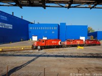 Framed in the usual industrial pipelines and fencing, Three geeps, three paint schemes with a nice (I use this term sarcastically) sky blue US Steel Hamilton works. The geeps are now off the roster. (Where now?).  These were dark days for the former Stelco, but the train action was still good as the recession was just a couple months from hitting peak and output had not yet been fully slashed. The blast furnace was turned on again in August, it was shut down again in October 2010, only to be idled for 3 years then permanently shut down. I was on my way to my Brothers with my daughter and wife and this was just one of my random run-ins en-route to a family visit.. just a couple photos and I did not give chase, wish I did but these were different times for me. Young kids will do that to you, with a second on the way at this point so my goose was cooked :) Happy to have what I have!