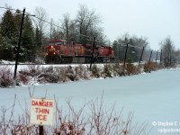 I had no plans to post this anytime soon, but <a href=http://www.railpictures.ca/?attachment_id=39764 target=_blank>Doug Page's recent photo</a> of the LS&I units at Campbellville was posted and I realized I had a very similar shot taken very recently..<br><br>I'll summarize what happened here simply, I don't want to write it all out and what happened just yet. Basically, 143 stalled on the hill earlier that morning, 246 came by and the chief asked 246 to donate a unit to 143.. which did not solve the problem, and making things worse, 246 was now stalled. Both trains were parked at the Kelso Ski Hill.. so much later that afternoon, 147 came rolling along, parked their train at Milton West, and light power went to the hill to shove 143 up the grade. After, 147 went  back down the hill for 246.. this is only a summary of what happened, the story is even better, and I'll write it some day :) But alas, Bill Purdy told me about the action and I decided to go have a look for myself on a bored Sunday afternoon. So here's a photo of 147 going back down the hill to give 246 a shove. Note how similar the pole line is in orientation in my shot to Dougs. I think this is a real close candidate for the time machine.. 