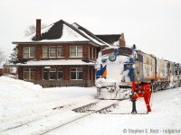 Here's hoping we get a lot of snow this year - this was my first plow chase and boy was this ever quite the day to go taking photos. Squalls off the lake, zero visibility at times, and blowing snow on roads made this one dicey drive. But here we are at Stratford, the chase is over and Cndr. Snook is kicking the shit out of a stubborn switchstand to get it in place so the crew can complete taking the siding and park the train in the yard. The matching RLK F units, RLK 4001 and plow sit on the turnout at a nice angle and the Stratford historic GTR station completes the scene. Note GEXR's orange plow GEXR 55408 (ex cn) at right which at the time was also in service. There was two plows at the same time out on the road during this era on GEXR!