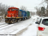 Three GMD1's visited the Guelph sub not long after taking over from GEXR and this one only led once - according to Jason Noe it was an IDU issue that had 1412 relegated to the middle most of the time. I've since shot 1412 in Hamilton leading on the N&NW spur but it's yard track down there not the mainline.   Seen here at Kent St passing the "street running" -  Metrolinx has since fenced everything off in this photo.

