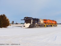 It's 6:04 PM and GEXR X518 is plowing westward on a beautiful Sunday afternoon, arriving in the farming community of Mitchell. On this run 3 men were up front operating the wings, flanger, and horn, plus 2 men the Engineer and Conductor in the trailing 3rd engine for a total of 5 men on this extra. The MOW men in the plow are paying close attention to the signs, and there are a ton on the pole just beside the farm pictured. The top 3 horizontal signs are to indicate to lift the flanger for the road crossing and the two switches just after the road: one for FS partners and the other is the Moffat & Powell spur. The 2 angled signs are to alert the crew to retract each wing for obstructions  - which would be the upcoming two Switchstands. This was my last shot in sun, 10 minutes later it would set for good behind clouds and I would turn for home. I probably should have just gone to see what it was like at Wards cut...  but these were heady days, I don't remember exactly how many plows I shot that year, but it was about 2 dozen. It was an insane winter - and right now I'm typing this as we get a crap ton of rain on January 11! Rats!