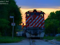 Celebrating #1000 on rp.ca - Steve Brattina is boarding M420 647 with slices of pizza for the boys who are hungry for supper, as the sun sets on a nice fall Evening. 647 has the green "second section" class lights going - there's a job just south of us at PDI liquids switching cars, while not a true second section, good enough for me! The boys would have a couple hours more work to do, after meeting the yard job they would have to switch out this train upon arrival at the junction.