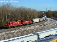 The CPR Waterloo subdivision runs 10 miles from Galt to Kitchener and T97, a local based out of Hagey yard in Cambridge (about 4 rail miles south) is arriving at the CN/CP interchange yard in Kitchener with cars of agricultural products. A lot of GEXR's CP cars come through this interchange as far as I can tell. What was nice about this is the pair of matching Beaver paint schemes introduced in 1997 <a href=http://www.railpictures.ca/?attachment_id=40043 target=_blank> See Jason Noe's photo here of the introduction train </a> which were ubiquitous in the early to mid 2000's are becoming rarer and rarer - except now being re-introduced on the rebuilds out of Progress and Wabtec. I enjoyed this scheme  am glad it's coming back - but these two really look worse for wear.<br><br>
History notes: This track pictured was put into service on 1 October 1961 for the re-alignment of the then Electric Grand River Railway. The new Highway 8 was built on some of their old alignment and instead of electrifying the new railway the decision was made to dieselize which happened on the same day. A deal was reached with the CNR to share the Huron Park spur (Then CNR Waterloo subdivision) between South Junction and North Junction where the CPR got back onto their own rails to Waterloo on the rest of the Grand River Railway. Just north of here is still known as South Junction where CPR gets onto CN rails to switch the interchange yard and the CPR can be found as far north as the highway underpass. The Waterloo sub north of South Junction was abandoned on 31 July 1993. (Source: Steel Wheels along the Grand, George W. Roth - was sold at Credit Valley Railway - copies may still be available)