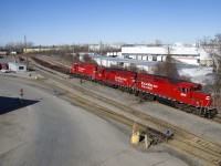 A trio of geeps (CP 2318, CP 2266 & CP 4515) lift some cars at Lachine IMS before leaving for nearby St-Luc Yard.