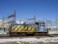 Ex-Port of Montreal SW1001 AXLX 7602 is about to head back towards the Axiall Canada Inc. plant once the switch at left is thrown. The track at right is CSX's Montreal Sub.