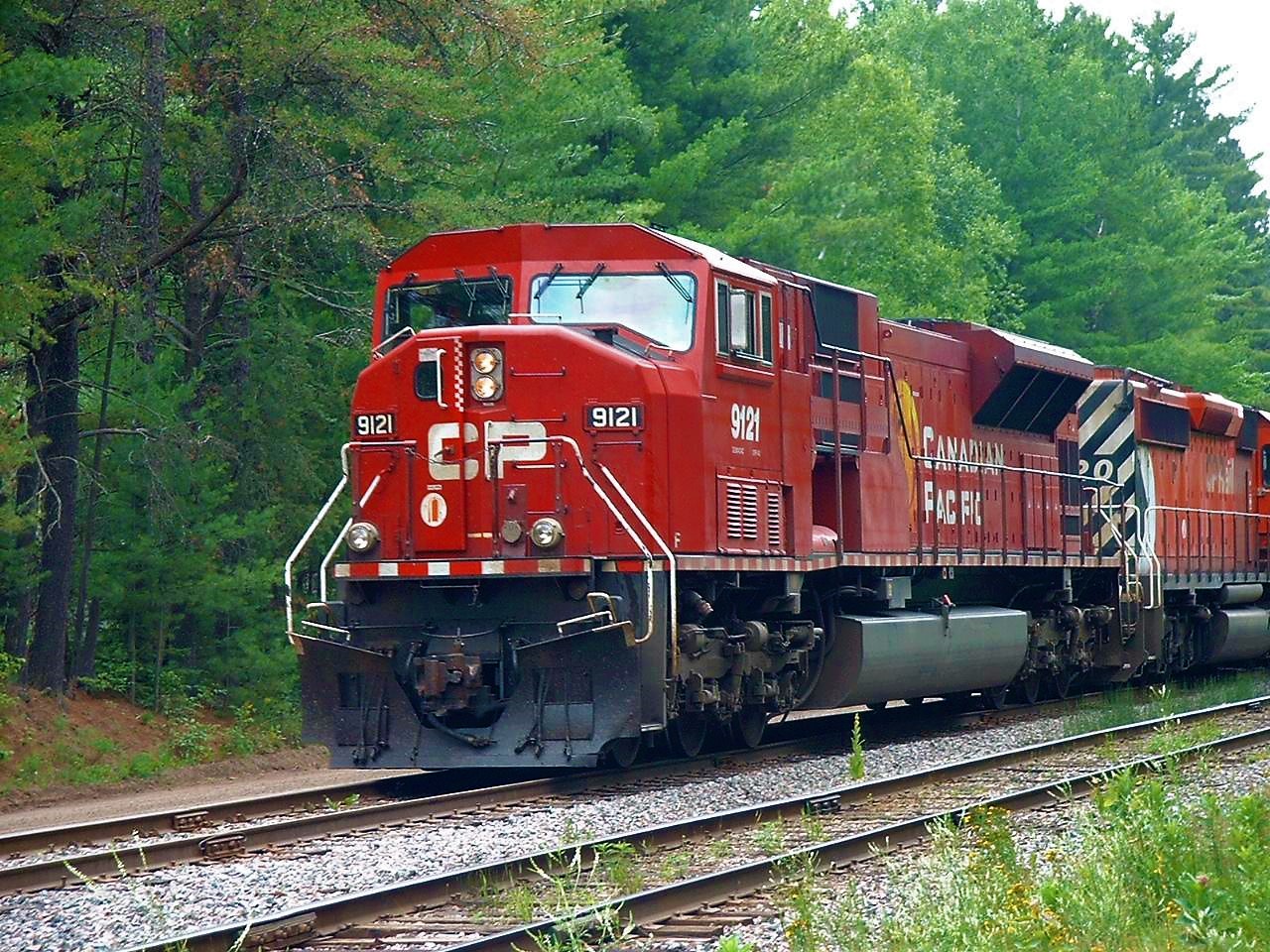 A nice change from parade of SD40-2s and AC4400s, SD9043MAC 9121 leads the daily intermodal to Smiths Falls where a CP crew will take it to Montreal. Unfortunately the tracks are no more in the Ottawa valley. The line from North Bay now ends at Mattawa.