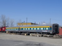 A pair of refurbished VIA Rail coaches (VIA 8109 & VIA 8100) is coupled to CAD 1825 (an ex-CP RS-18), I believe a VIA Rail engine was about to pick them up to bring them to the Montreal Maintenance Centre.