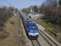 AMT 1362 is on the rear of a deadhead move that is passing through the combined stations of Canora and Mont-Royal. This line was double-tracked until the summer of 2018 when work started on the REM light rail project. This work necessitated the closure of the existing Canora and Mont-Royal stations, with a new one located roughly halfway between the two stations. The track at right is not in use and has been paved over both north and south of there. This part of the Deux-Montagnes line was supposed to be closed for a number of years starting March 29th, but all work on the REM project has stopped for the time being and trains are still running here.