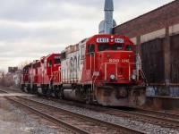 One of the few remaining GP38s in Soo colours made its way up to Ontario late last year. I was able to catch it multiple times, but this tops them all. Three geeps head back to Lambton after dropping off a TTC streetcar at Hillcrest. 