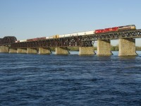 CP 7010, CP 7002 and CP 2253 lead CP 253 over the St. Lawrence River on a gorgeous morning. CP 7010 has led CP 253 a number of times over the past few weeks.