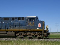 The leader on CN 327 (CSXT 3415) has a decal for CSX predecessor Georgia Railroad as it heads south on the wye leading from the Kingston Sub to the Valleyfield Sub.