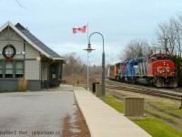 I've driven by this spot a few dozen times on the way to Port Dover, wishing that one day I might get lucky getting something here. Imagine my delight when chasing 5273 down the Hagersville they stopped to work Nicholson-Cates on the old CNR Dunnville sub allowing me to place the train beside the well kept GTR station. Built in 1908 it was the <a href=https://en.wikipedia.org/wiki/Caledonia_station_(Caledonia,_Ontario) target=_blank>foresight of Ron Clark who bought the station to save it from demolition</a> - and thank goodness he did - what a great job  Ron and the people of Caledonia have done, other communities would not be as lucky (ie:<a href=http://www.railpictures.ca/?attachment_id=36002 target=_blank> Ingersoll)</a>.