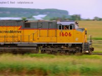 The Next Generation of Progress has the helm of this eastbound reroute freight making good time up the grade on the Halton subdivision. The quaint rural scenes  between Burlington and Milton seem far away from the hustle and bustle of the Greater Toronto Area and are a nice place to take a break from it all. I love that you can get the Niagara Escarpment and nice farms in your photos, as seen in the background.<br><br>
Will CN actually place a firm order for these Tier 4 demos? Will any of the new "Caterpillar yellow" demonstrators lead?