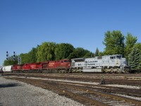 Air Force unit CP 7023 leads three GE's (CP 8824, CP 9835 & CP 8116) as CP 253 passes Lasalle Yard on a gorgeous morning.