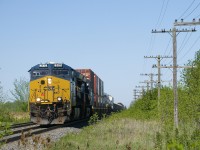 CN 327 with CSXT 3415 and CSXT 3390 is close to Coteau, where it will set off cars before heading south.