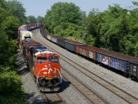 CN 120 has CN 3901 and CN 3142 for power and a 484-axle long train as it passes stored gondolas that are on the transfer track of CN's Montreal Sub. CN 3901 is a tier 4 credit unit that was delivered to CN towards the end of last year.