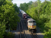 CP 253 with SD70ACU's CP 7010 and CP 7043 is passing North Jct, its voyage from Saratoga Springs nearly over.