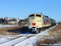 OSR's St. Thomas turn has just finished work in the former CPR formet yard in St. Thomas and just reversed over the CNR Cayuga subdivision diamond. The crew is seen approaching the Wabash transfer to fetch the rest of their train then head west into St. Thomas proper to work the yard there where they'll give me a few tries at the Tresle, for me , the first time with matching OSR painted F units. I wonder how many times Wabash F7's worked the Wabash Transfer in their 30 or so years of service in Canada. I love posting shots like this on blistering hot days, reminds of the cold we sometimes complain about. Looks good now doesn't it :)