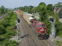 CP 112 splits the signals just east of Cedar Park Station with a nearly 600-axle long train.