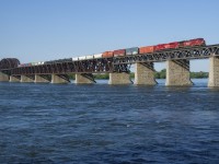 Rebuilds CP 8055 & CP 7031 lead CP 253 over the St. Lawrence River on the west track of CP's Adirondack Sub.