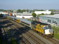 The second and last VIA Rail departure of the day from Montreal to Toronto (VIA 669) heads west with VIA 6402 up front and VIA 6419 bringing up the rear.