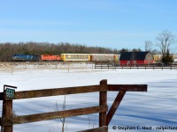 Skirting the town of Puslinch along Gore Rd, the border between North Dumfries and Puslinch, 147 passes one of the many hobby farms located here. One of my favorite stretches of railroad for photography, close to home (about 11 minutes from door to tracks) is quickly being over run with severances. New hobby farms and houses (about a dozen) have gone up along here and this view is no longer possible. Too bad. I'm told lots fetch about $400-500k now with nothing on them, no wonder farmers are cashing in.<br><br>
BTW, i'm told the CEFX leasers are no longer leased to CP and have mostly been sent back. Some still around, but I believe they are off CP lease and basically stored waiting movement to new locations. You don't know what you have until it's gone, right? If anyone captured one of these CEFX units (clearly) with a SD70ACU that would be quite the rarity on CP. Probably going to happen if these end up with other railroads (BNSF, etc).