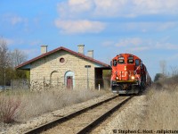 Well, vastly different lighting conditions, overgrown weeds, and other challenges meant I couldn't replicate <a href=http://www.railpictures.ca/?attachment_id=26906 target=_blank>This GEXR shot</a> I did a couple years ago, but a trio of GP9's lead this L568 past the historic St. Marys Junction station on a nice spring day. I'll try again in the fall some year and see if I can even get close. It is really badly overgrown and i'm sure much worse now.