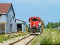 Built as CN 4004 in 1966 as a straight GP40, 4095 trails on GEXR 581 as they arrive in Clinton Ontario. Rarely can you get a train in perfect nose light on GEXR as they run west in the morning and east in the afternoon, but this light power move fit the bill. I was camping nearby in Auburn Ont with family and friends and timed a brief excursion to meet the train, perfectly as by the time I got trackside the train was in view. They ran light power Stratford to Hensall, grabbed 2 cars, and returned to Stratford, a 90 mile round trip. I repeated the same feat <a href=http://www.railpictures.ca/?attachment_id=39511 target=_blank>the next day in Goderich</a>.<br><br> Curious, how many straight 40's still exist and was this converted to a -2? I can't imagine there are many around. Also, P.S - I understand this area (exeter in particular) got hit hard with today's storm. Hope all is OK!