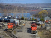 Seeing double, The 0700 yard job switches Hamilton Yard with GMD-1 1408 which had recently arrived from Winnipeg, and GMD-1 1439 waits on the oil track for a crew to arrive to begin work. Notice how 1408 lacks a nose door and 1439 has one. Curious to why?