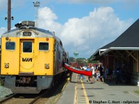 Quintessentially Canadian, A family boards a Canoe into the RDC-4 6250 where adventure soon awaits in the Ontario wilderness after departing the CPR Sudbury station.