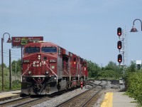 After having advanced towards Lachine Sation, CP 112's power is backing up towards Lachine IMS Yard where it will tie on to its non-intermodal cars and continue on to St-Luc Yard.