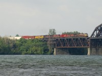 CP 253 has quite a bit of power and a heritage unit leading (CP 7019, CP 9769, CP 2229, CP 8562, CP 9718 & UP 3069) as it leaves the St. Lawrence Seaway behind and starts its crossing of the St. Lawrence River on a windy and mostly cloudy morning.