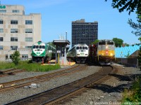 Hamilton is flush with heritage in this photo, mind you, some is a bit of a stretch. A nod to TH&B still adorns the iconic Hunter St Terminal while a CP Heritage paint passes two different GO schemes laying over for the weekend. According to the <a href=http://www.trha.ca/trha/historic-note-opening-of-thb-hunter-st-station-in-hamilton-ontario/ target=_blank>THRA.CA who wrote in 2010 </a> that the Hunter St was designed by Fellheimer & Wagner who also created Buffalo Central Terminal and Cincinnati's iconic Union Terminal (now known as CUT, a train station and busy museum). At least we still have a world class design used for passenger trains 90 years later unlike Buffalo. <br><br> Interestingly enough GO Transit was found here <a href=http://www.railpictures.ca/?attachment_id=29893 target=_blank> Well into the TH&B Era</a>, funny how it took a couple decades to actually get regular GO service which began in 1996. 