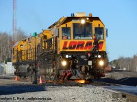 I much prefer the older, gritter rail grinders, but here's a rather modern Loram rail grinder doing what it does best, not long before CP put all kinds of concrete barriers around the curve ruining chances of a repeat shot of this. Too bad, another good photo spot bites the dust. 