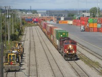 After being held out of the yard for a few hours (with CP 9112 ahead), CP 112 is on the move as it slowly enters Lachine IMS Yard. 