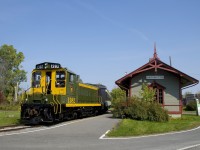 CN 1382 pushes an excursion train past Barrington Station at Exporail.