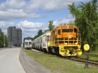 QGRY 2300 is in the process of setting off 27 hoppers at the CRH Canada Joliette Cement Plant; once that is completed it will pick up 9 hoppers and head back towards Lanoraie. This is business that the QGRY has gotten back (from CN), as this track had been out of service a number of years and was only put back into service at the start of this summer. This plant is located on the ex-CP St-Gabriel Spur, which has a number of clients in and close to Joliette. The local on this line also interchanges with CN and the chemin de fer Lanaudière (CFL).