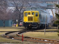 For Larry and James, Here's a photo I might be able to re-do soon, NSC pushing across the unprotected crossing (industrial track) out front of Dofasco, NSC 11 is shoving a cut of cars onto the coke oven leads for storage. Moves here still happen, Saw it last weekend while driving through but was unable to get a shot. Next time.

