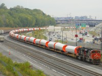 Windmill train CN 319 is approaching Turcot Ouest with CN 8807 & CN 5733 for power. 