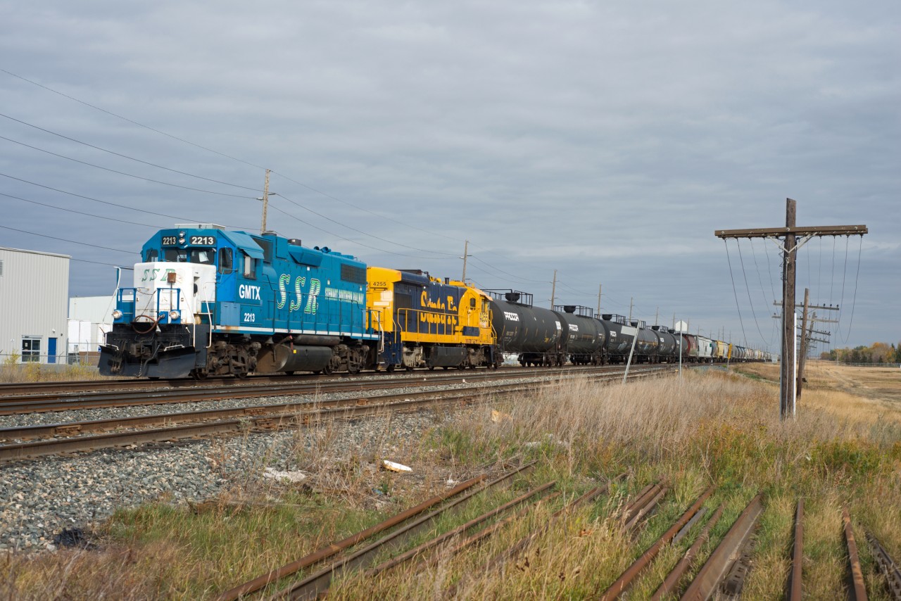 Stewart Southern Railway is seen here arriving at CP's Regina yard with a good sized train of loads to interchange. With GP38-2 GMTX 2213 and B23-7 SSS 4255 up front you wouldn't know this is a Watco owned operation.