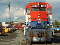 I would imagine this was train 431 having arrived in Sudbury and parked, finishing their day in the yard. I happened upon it and followed them to a parking spot while the sun danced in and out.. iconic sudbury water towers in the distance. Three RLK units on this train.